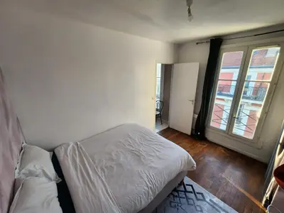 Un ou plusieurs lits dans un hébergement de l'établissement Quiet Cosy Apartment near Montmartre - Paris