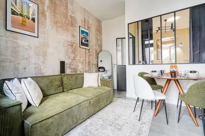 Coin salon dans l'établissement Charming Parisian loft for 2 to 4 people