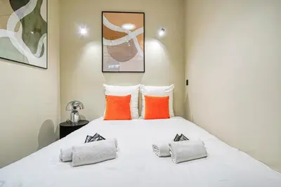Un ou plusieurs lits dans un hébergement de l'établissement Charming Parisian loft for 2 to 4 people