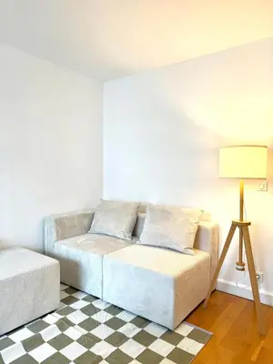 Coin salon dans l'établissement Appartement familial 2 chambres avec balcon