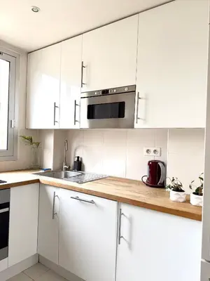 Cuisine ou kitchenette dans l'établissement Appartement familial 2 chambres avec balcon