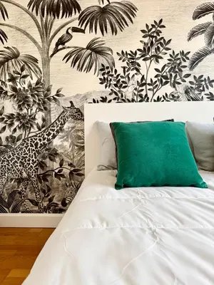 Un ou plusieurs lits dans un hébergement de l'établissement Appartement familial 2 chambres avec balcon