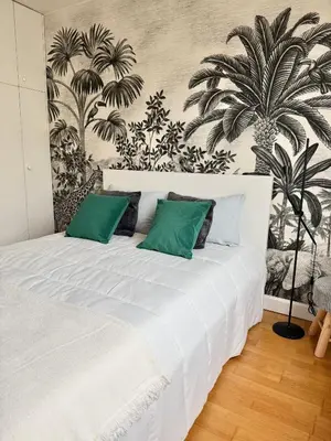 Un ou plusieurs lits dans un hébergement de l'établissement Appartement familial 2 chambres avec balcon