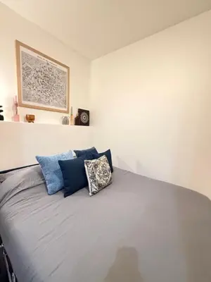 Un ou plusieurs lits dans un hébergement de l'établissement Studio one street away from the Marais!