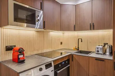 Cuisine ou kitchenette dans l'établissement Modern 1BDR flat in the heart of Paris