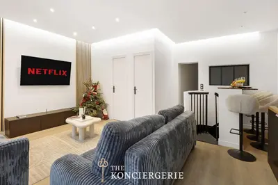 Télévision ou salle de divertissement dans l'établissement Appartement dException avec Home Cinema Prive