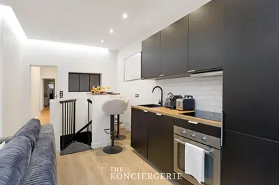 Cuisine ou kitchenette dans l'établissement Appartement dException avec Home Cinema Prive