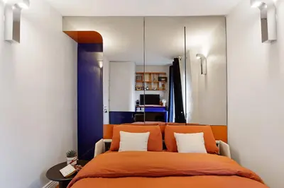 Un ou plusieurs lits dans un hébergement de l'établissement Studio elegant pres de Montmartre et Sacre-Coeur