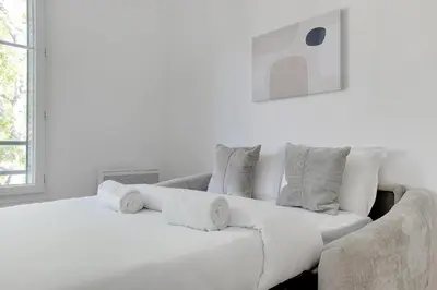 Un ou plusieurs lits dans un hébergement de l'établissement New, air-conditioned apartment - close to Paris