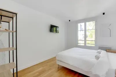 Un ou plusieurs lits dans un hébergement de l'établissement New, air-conditioned apartment - close to Paris