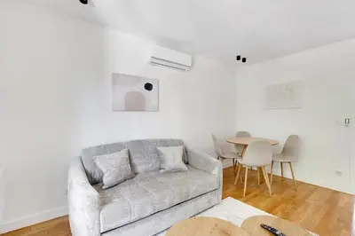 Coin salon dans l'établissement New, air-conditioned apartment - close to Paris