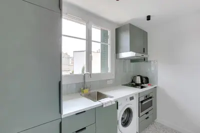 Cuisine ou kitchenette dans l'établissement New, air-conditioned apartment - close to Paris