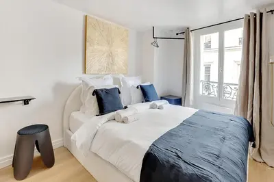 Un ou plusieurs lits dans un hébergement de l'établissement Bright studio close to Bastille