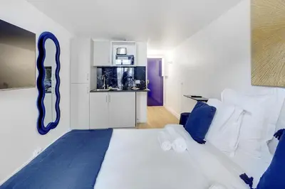 Un ou plusieurs lits dans un hébergement de l'établissement Bright studio close to Bastille