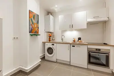 Cuisine ou kitchenette dans l'établissement B1#Premium#2Bedrooms#ArcdeTriomphe#AC#ChampsElysées