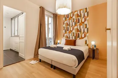 Un ou plusieurs lits dans un hébergement de l'établissement B1#Premium#2Bedrooms#ArcdeTriomphe#AC#ChampsElysées