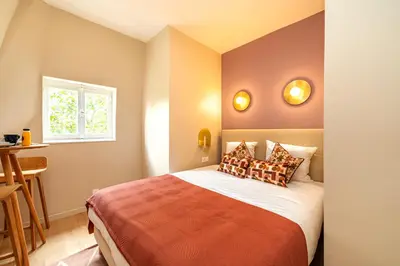 Un ou plusieurs lits dans un hébergement de l'établissement Cozy and well arranged studio - Pereire