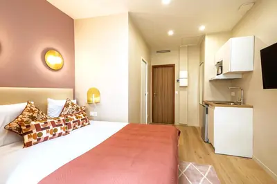 Un ou plusieurs lits dans un hébergement de l'établissement Cozy and well arranged studio - Pereire
