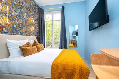 Un ou plusieurs lits dans un hébergement de l'établissement Air-conditioned & fully equipped studio in Paris 17