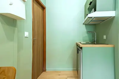 Cuisine ou kitchenette dans l'établissement Air-conditioned design studio