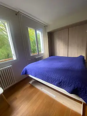 Un ou plusieurs lits dans un hébergement de l'établissement Quiet Furnished Studio in Neuilly