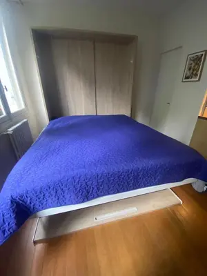 Un ou plusieurs lits dans un hébergement de l'établissement Quiet Furnished Studio in Neuilly