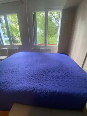 Un ou plusieurs lits dans un hébergement de l'établissement Quiet Furnished Studio in Neuilly