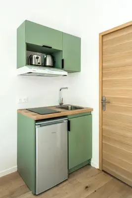Cuisine ou kitchenette dans l'établissement Elegant 2-room air-conditioned apartment - Paris 17