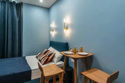 Coin salon dans l'établissement Air-conditioned & comfortable studio - Batignolles side
