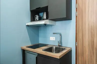 Cuisine ou kitchenette dans l'établissement Air-conditioned & comfortable studio - Batignolles side