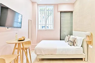 Un ou plusieurs lits dans un hébergement de l'établissement Central, cozy and air-conditioned - Paris 17