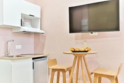 Cuisine ou kitchenette dans l'établissement Central, cozy and air-conditioned - Paris 17