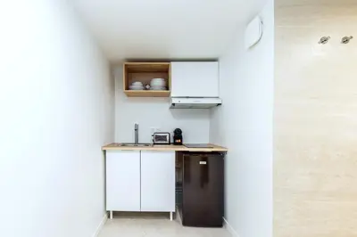 Cuisine ou kitchenette dans l'établissement Central, air-conditioned and designer - Pereire
