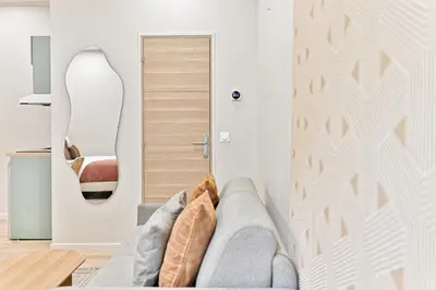 Coin salon dans l'établissement Air-conditioned & comfortable studio in Paris 17