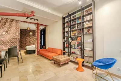 Coin salon dans l'établissement Charming Loft 2p Montmartre Joffrin