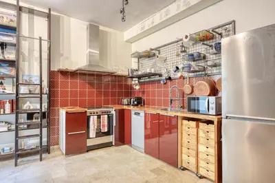 Cuisine ou kitchenette dans l'établissement Charming Loft 2p Montmartre Joffrin
