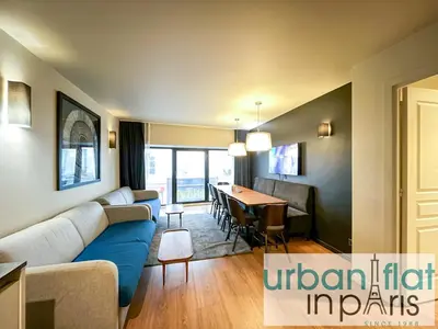 Coin salon dans l'établissement UrbanFlat 132 - Superbe appartement de 4 chambres dans le centre