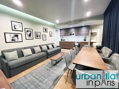 Coin salon dans l'établissement UrbanFlat 79 - Bel appartement de 4 chambres Republique
