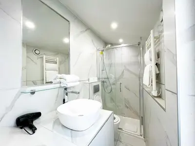 Salle de bains dans l'établissement UrbanFlat 115 - Grand Duplex dans le centre de Paris