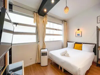 Un ou plusieurs lits dans un hébergement de l'établissement UrbanFlat 115 - Grand Duplex dans le centre de Paris