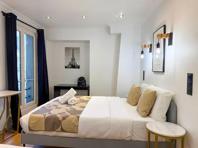 Un ou plusieurs lits dans un hébergement de l'établissement UrbanFlat 102 - Large apartment Opera District