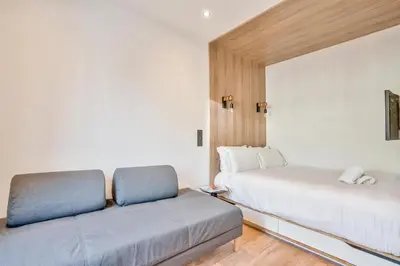 Un ou plusieurs lits dans un hébergement de l'établissement UrbanFlat 102 - Large apartment Opera District