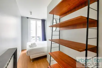 Un ou plusieurs lits dans un hébergement de l'établissement UrbanFlat 136 - Duplex de 4 chambres Saint Sebastien