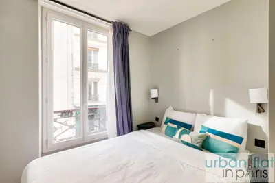 Un ou plusieurs lits dans un hébergement de l'établissement UrbanFlat 136 - Duplex de 4 chambres Saint Sebastien