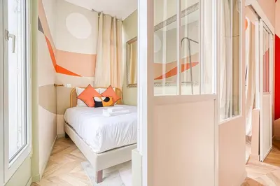 Un ou plusieurs lits dans un hébergement de l'établissement Comfortable 3 rooms with air conditioning