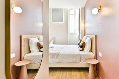 Un ou plusieurs lits dans un hébergement de l'établissement Cozy air-conditioned studio Pré-St-Gervais