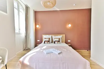 Un ou plusieurs lits dans un hébergement de l'établissement Cozy air-conditioned studio Pré-St-Gervais