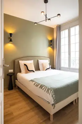 Un ou plusieurs lits dans un hébergement de l'établissement Charming and spacious air-conditioned apartment