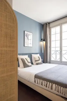 Un ou plusieurs lits dans un hébergement de l'établissement Air-conditioned and cozy haven
