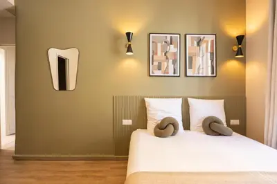 Un ou plusieurs lits dans un hébergement de l'établissement Stylish & Cozy Air-Conditioned Studio